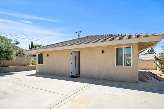 back of house featuring a patio