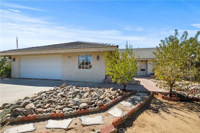 ranch-style house with a garage