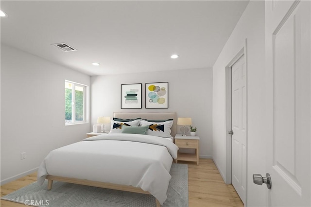 bedroom featuring light hardwood / wood-style floors