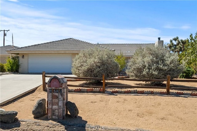 view of front of property with a garage