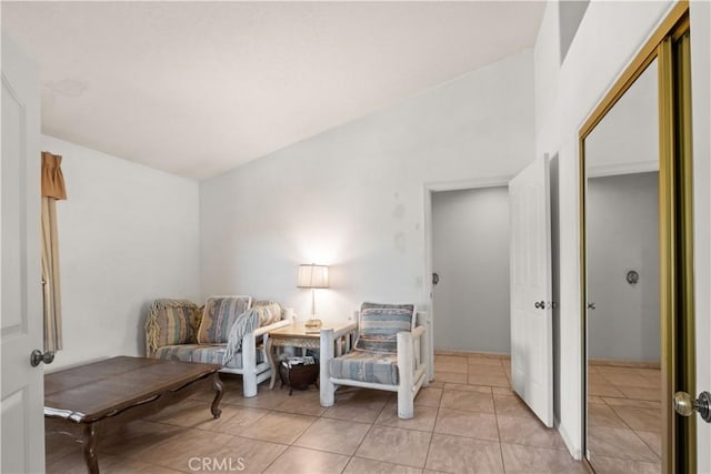 living area with light tile patterned floors