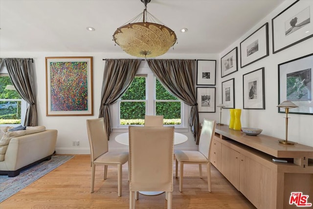 dining space featuring light hardwood / wood-style flooring