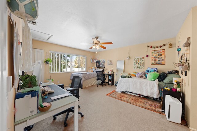 carpeted bedroom featuring ceiling fan