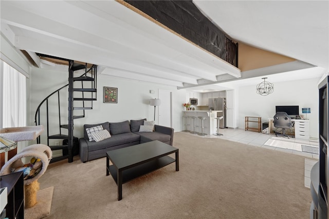 living room featuring beam ceiling, light colored carpet, and an inviting chandelier