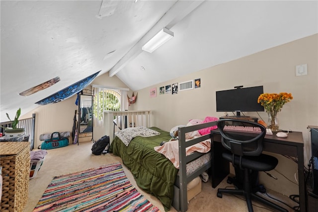 bedroom with carpet flooring and vaulted ceiling with beams