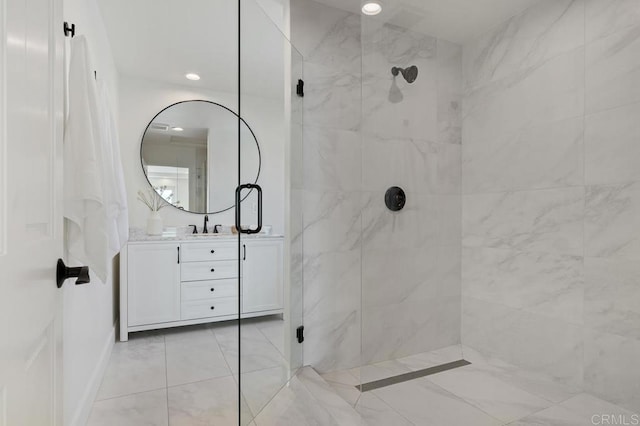 bathroom featuring vanity and walk in shower