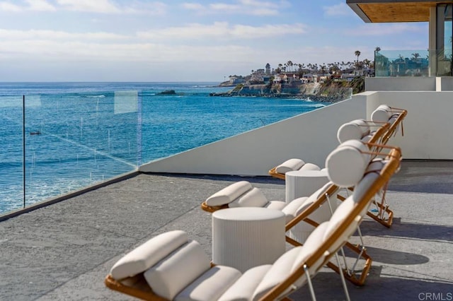 view of pool featuring a water view