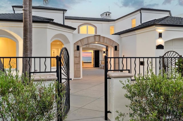 entrance to property featuring a garage