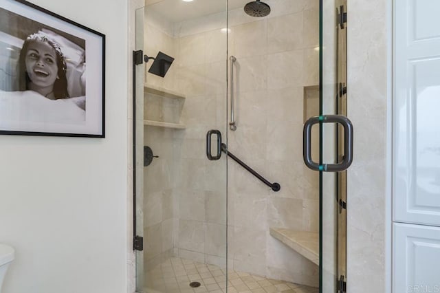 bathroom with an enclosed shower