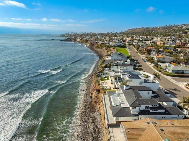 aerial view featuring a water view and a beach view