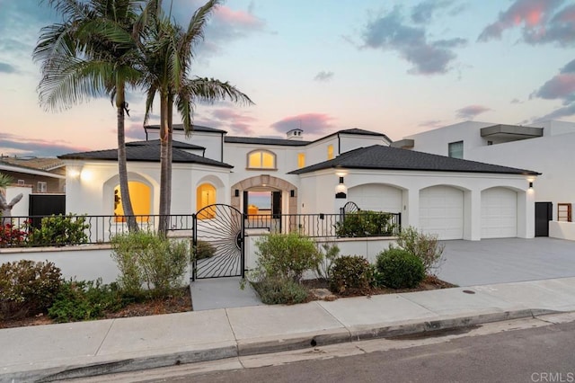 view of front of home with a garage