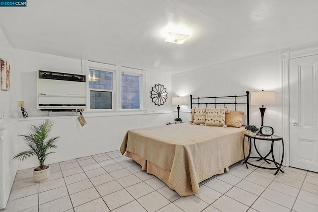 bedroom with light tile patterned flooring