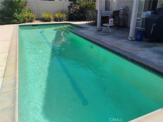 view of pool with a patio area