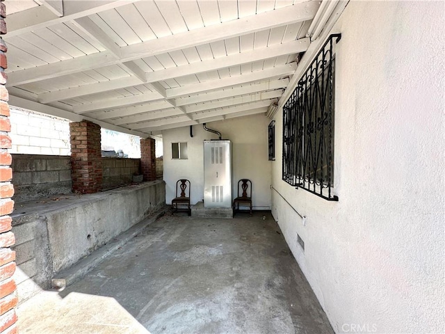 view of patio / terrace with a carport