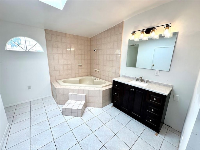 bathroom with tile patterned flooring, vanity, and separate shower and tub