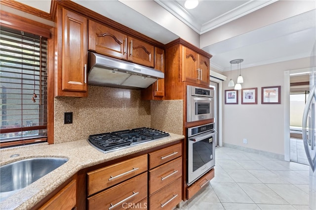 kitchen featuring stainless steel gas cooktop, tasteful backsplash, light tile patterned flooring, and crown molding