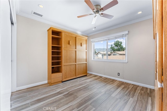 unfurnished bedroom featuring ceiling fan, a closet, light hardwood / wood-style flooring, and ornamental molding