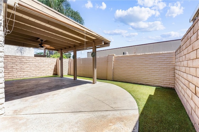 view of patio featuring ceiling fan