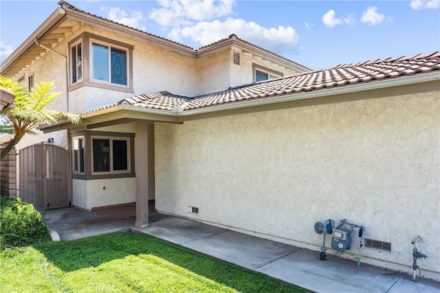 back of house featuring a patio