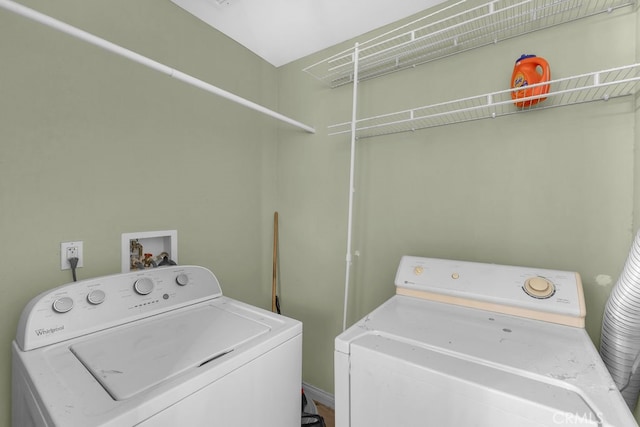 laundry area with separate washer and dryer