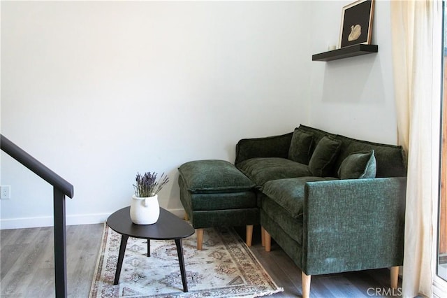 living area featuring hardwood / wood-style floors