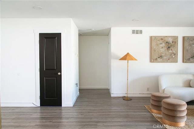 unfurnished room featuring wood-type flooring