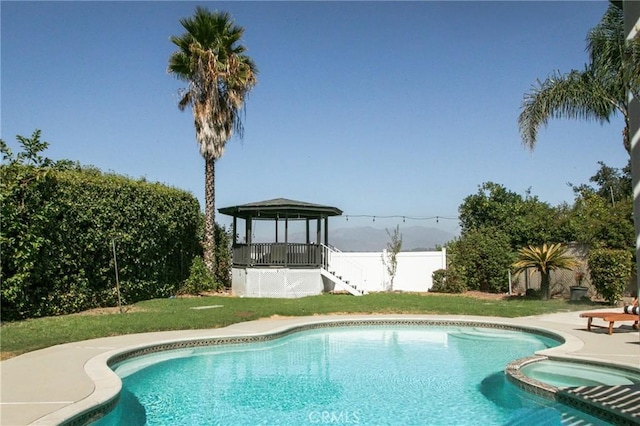 view of pool featuring a gazebo, a yard, and a patio