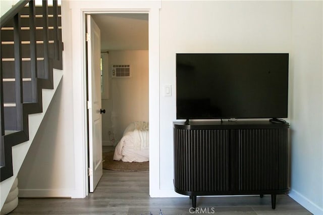 unfurnished living room with hardwood / wood-style floors