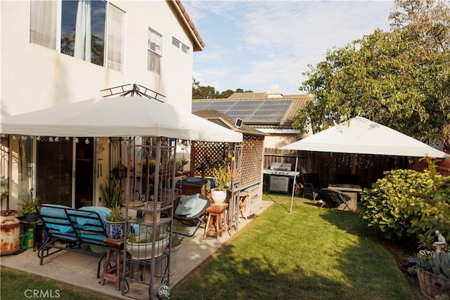 exterior space featuring a grill and exterior kitchen