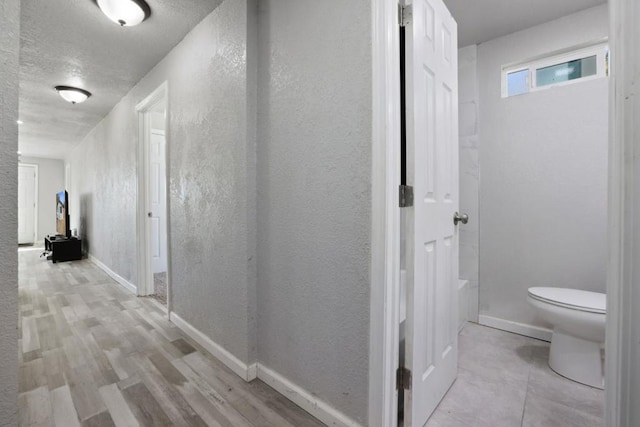 hall featuring light hardwood / wood-style flooring