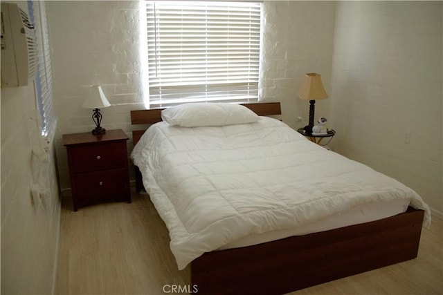 bedroom featuring light hardwood / wood-style floors