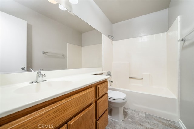 full bathroom with shower / bathtub combination, vanity, and toilet