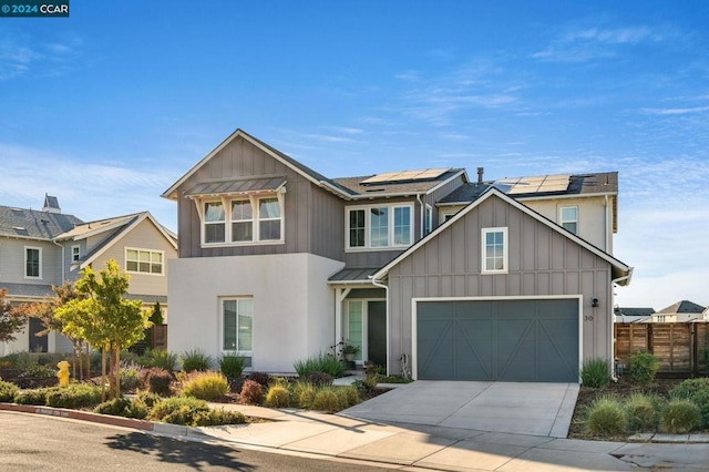 view of front of home featuring solar panels