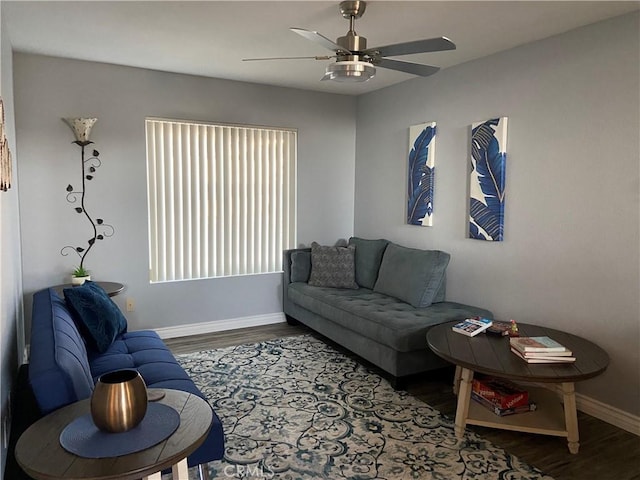 living room with hardwood / wood-style floors and ceiling fan