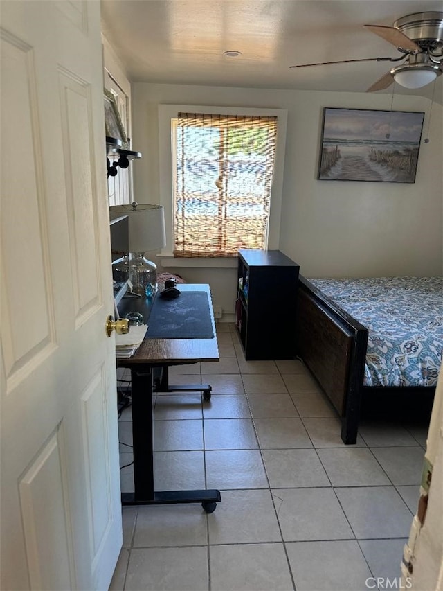 bedroom featuring ceiling fan and light tile patterned floors