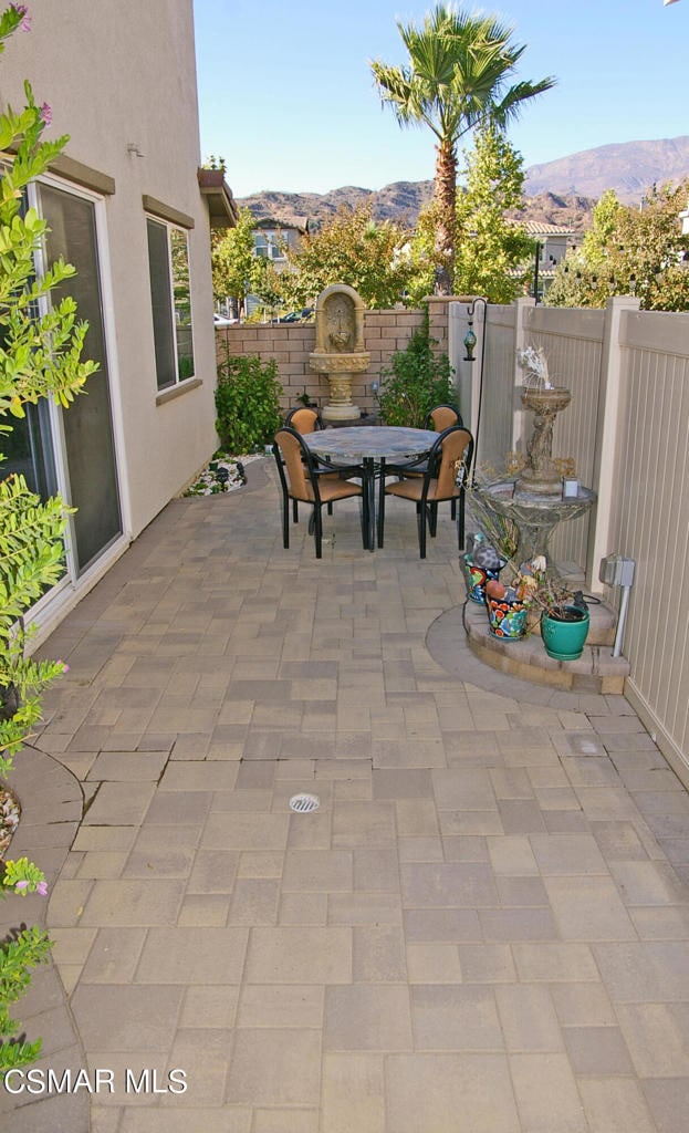 view of patio with a mountain view