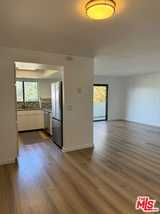 interior space featuring dark hardwood / wood-style floors and sink