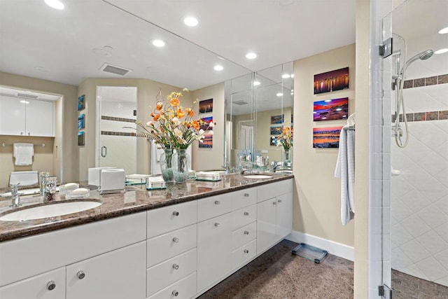 bathroom with vanity and walk in shower