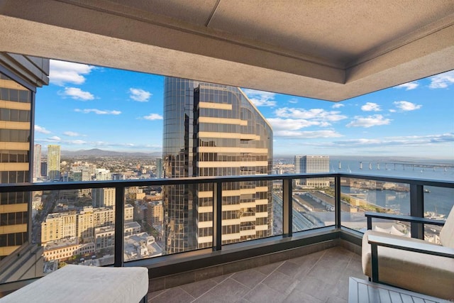 balcony featuring a water view