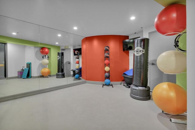 workout room with concrete flooring