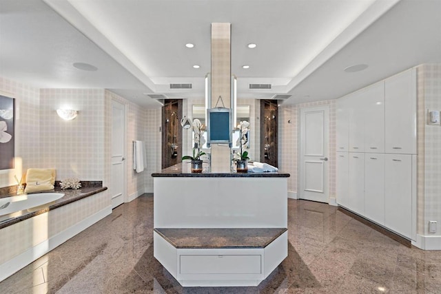 kitchen with white cabinets