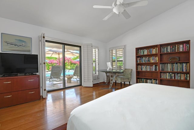 bedroom featuring vaulted ceiling, ceiling fan, access to exterior, and light hardwood / wood-style flooring