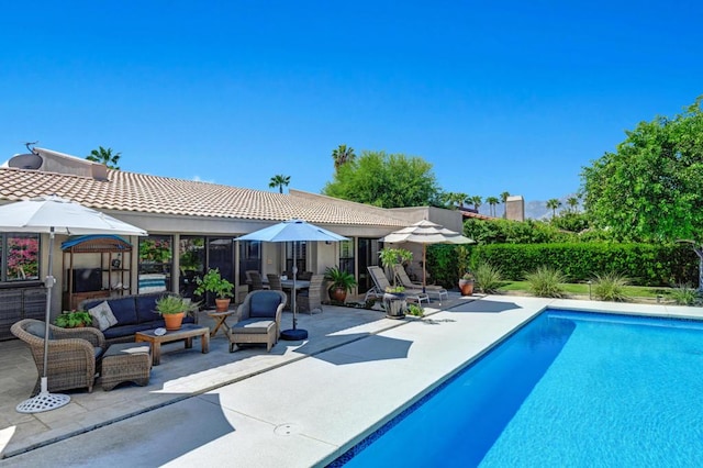 view of swimming pool with an outdoor hangout area and a patio area