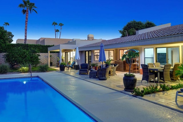 view of pool with an outdoor hangout area and a patio area