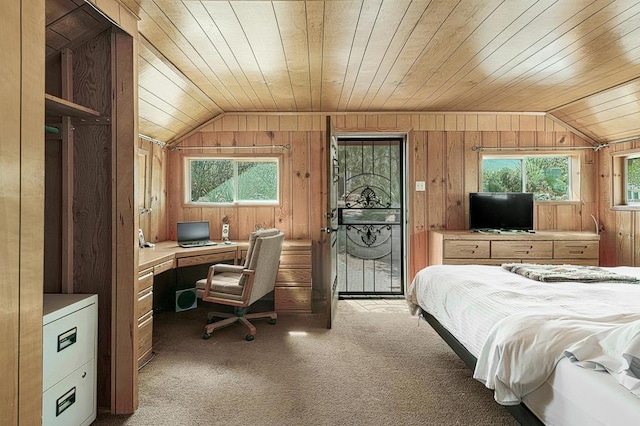 bedroom featuring carpet, wood walls, wood ceiling, and multiple windows