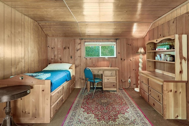 bedroom with wooden ceiling, wooden walls, and vaulted ceiling