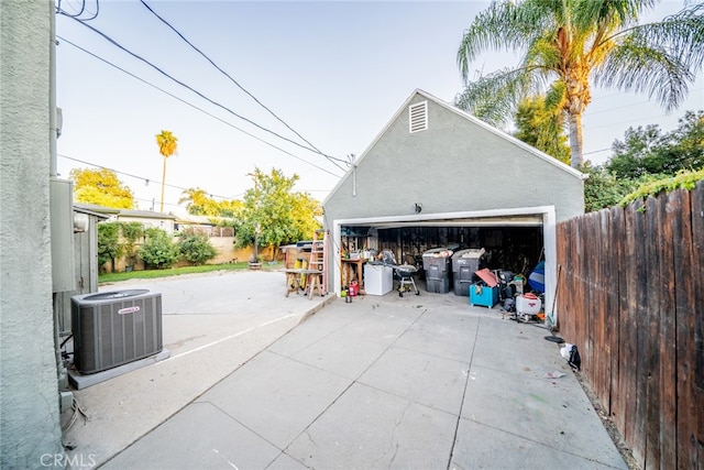 garage with central AC unit