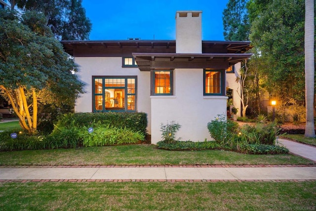 view of front of house with a front yard