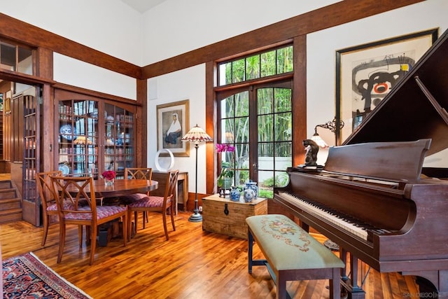 interior space with hardwood / wood-style floors and french doors