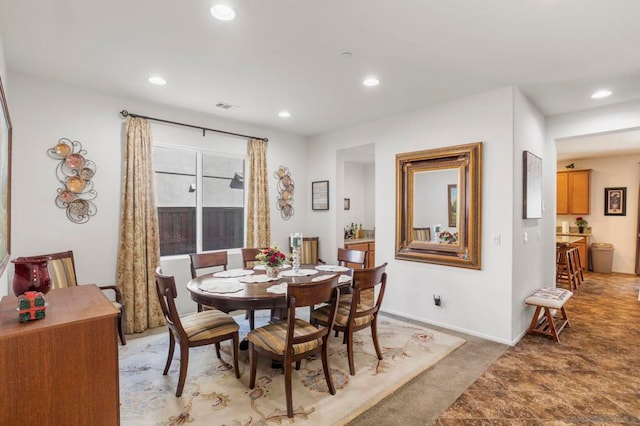 view of carpeted dining room